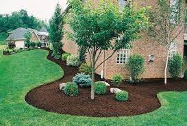 What Color Mulch for a Brick Red, Grey, White & Yellow House? 3 Dark-Brown-Mulch-for-red-brick-house